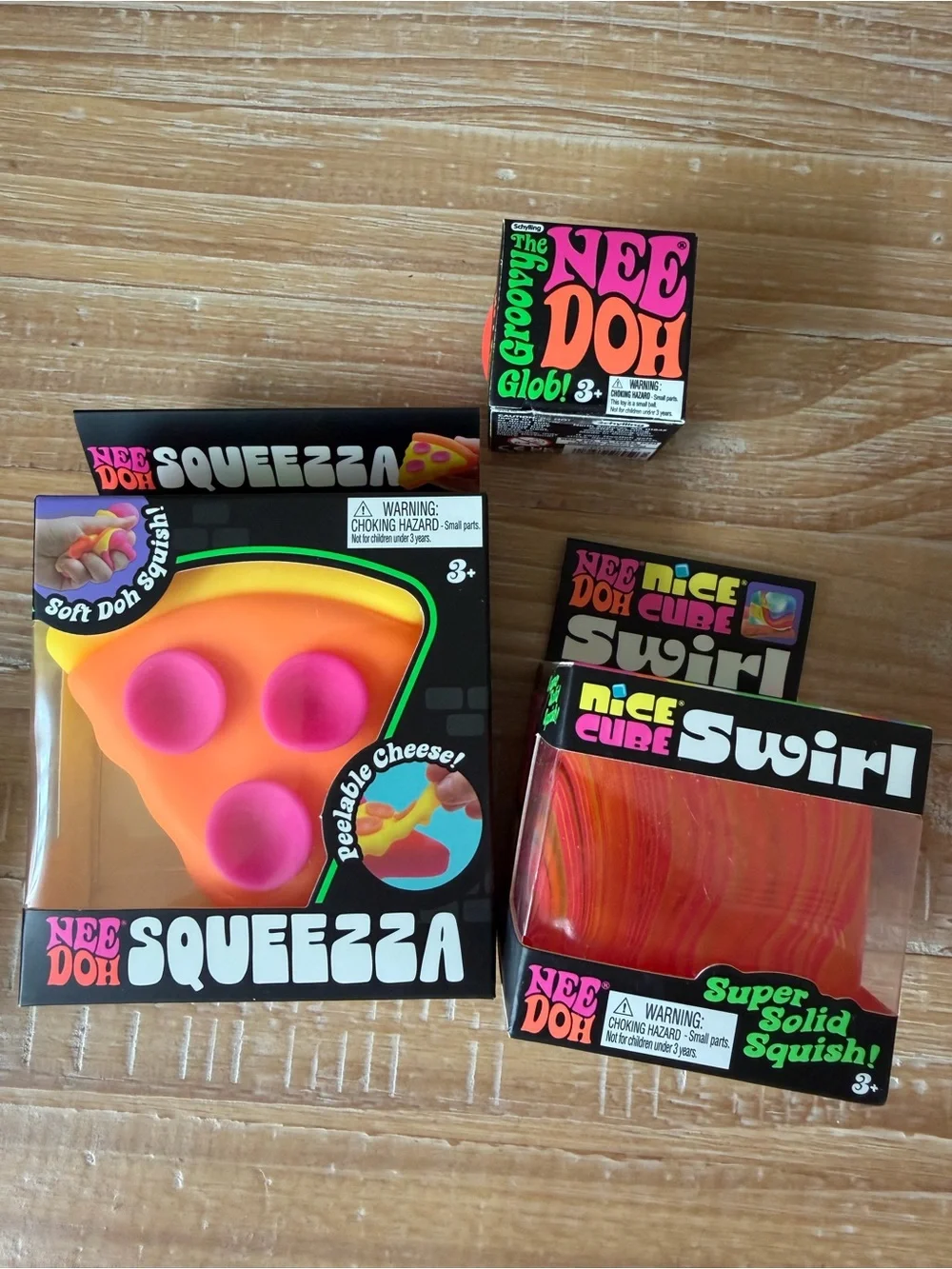 Squeezza Pizza & Swirl Nice Cube & teenie Groovy Toy Set - Orange, Pink, Red